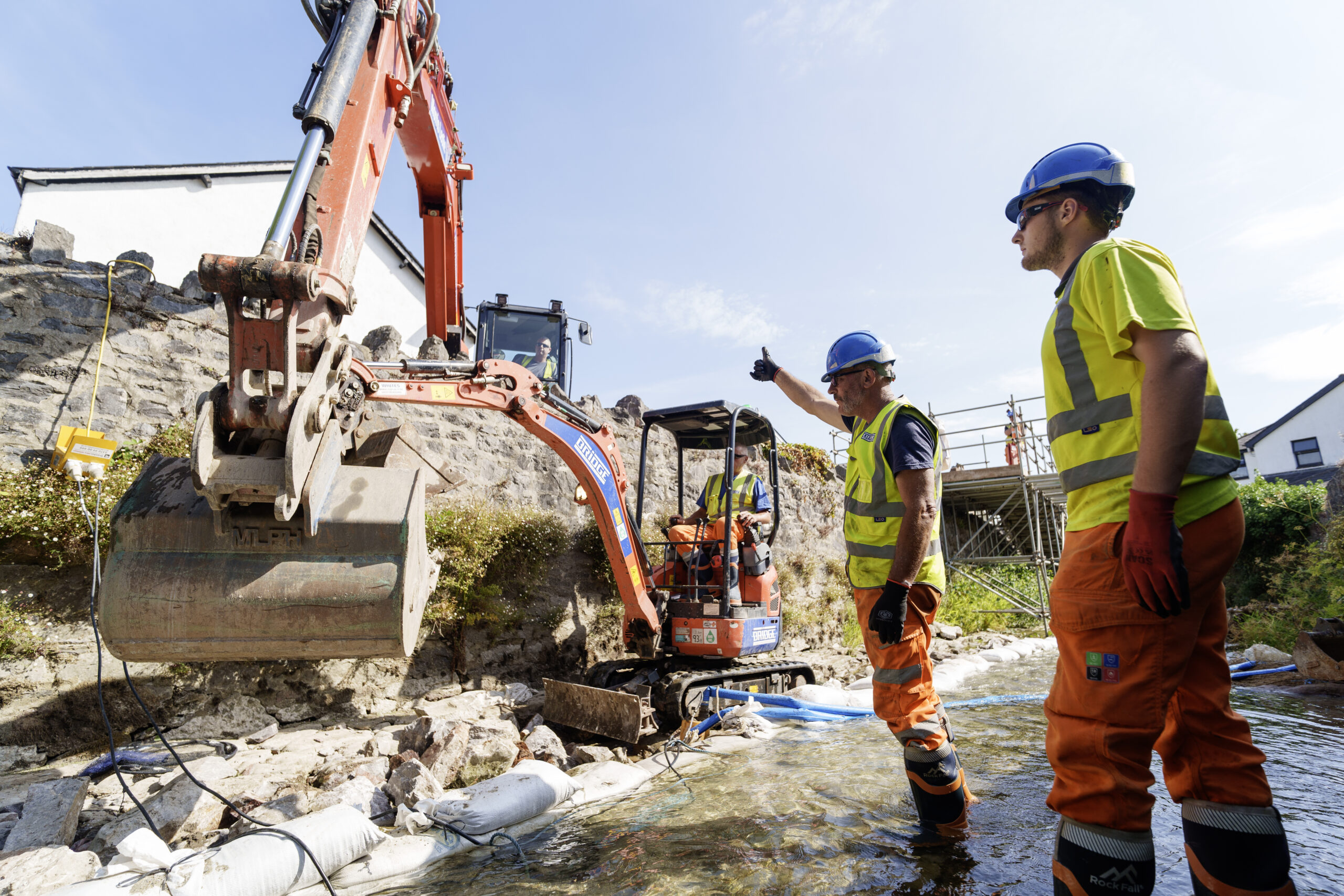 Bridge team members working together on a civil engineering site